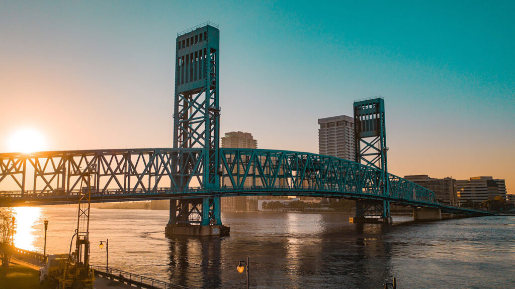 Bridge over the water at sunset
