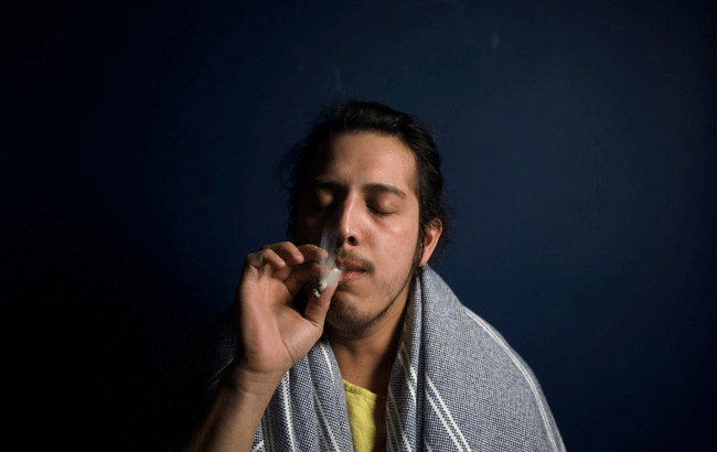 person smoking a joint