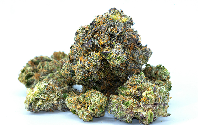 Several chunks of dark green buds with light green highlights and orange pistils.