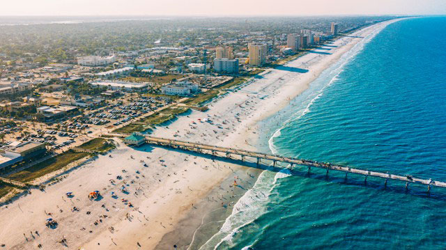 A huge boardwalk on the beach in Jacksonville Beach, Florida.