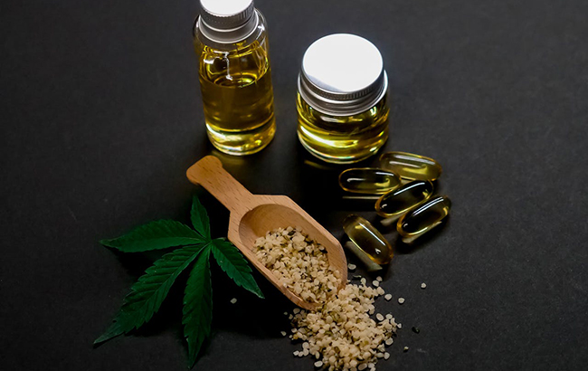Cannabis seeds and tiny jars 