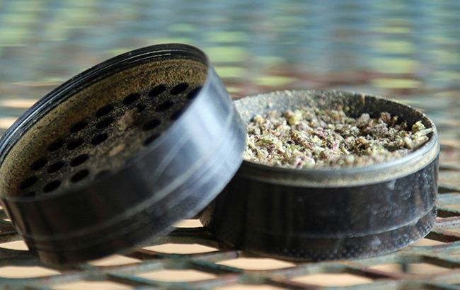 cannabis grinder with flower inside